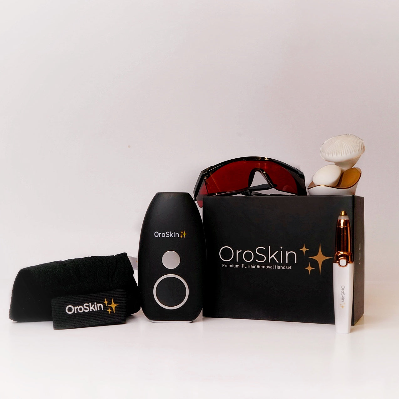 OroSkin PACKAGE Oro skin ice IPL, oro skin brush, oro skin 2 in 1 trimmer, oro skin glove, oro skin safety glasses